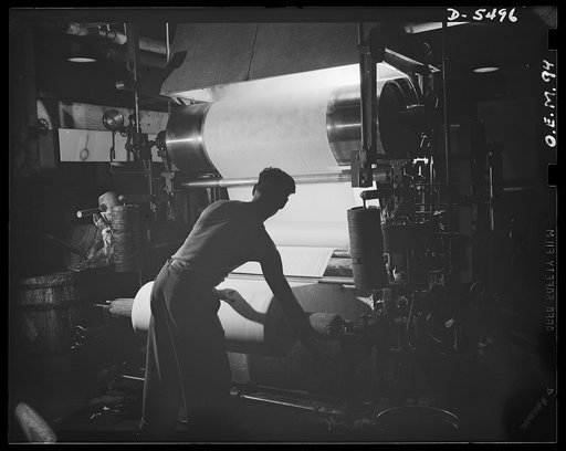 Production. Parachute cloth and shrouds. Silk parachute cloth is straightened, tentered to width, and finished in an Eastern plant. It will soon be ready for making into parachutes for American flyers