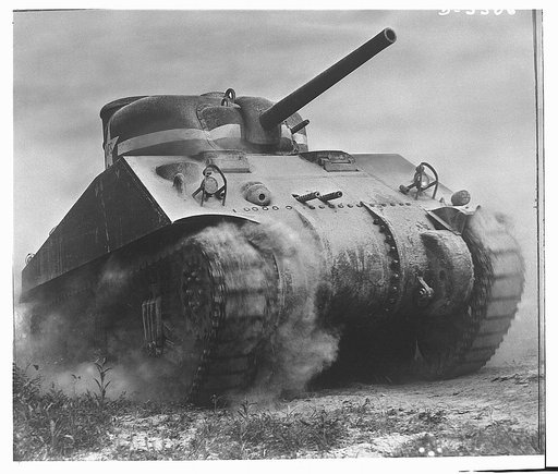 Fort Knox. M-4 tanks. One of our new battleships of the land, a mighty M-4 tank that will disturb a lot of Axis plans. In the welded hulls of these massive machines armament that insures tremendous fire power is in the hands of tough, resourceful "tankers." Location: Fort Knox, Kentucky