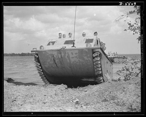New River, North Carolina. Marine amphibian tractor. "The Marines have landed, and have the situation well in hand." A special leatherneck unit, training with new amphibian tractors at New River, North Carolina, is ready for any shore opposition as its land-and-water troop carrier brings them ashore