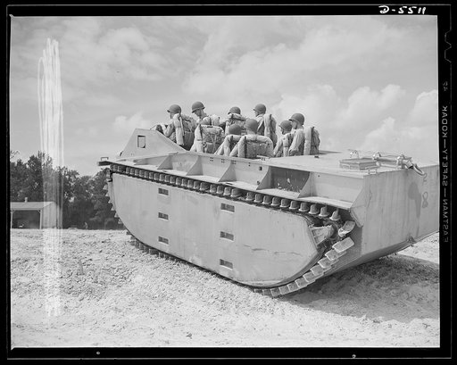 New River, North Carolina. Marine amphibian tractor. "The Marines have landed, and have the situation well in hand." A special leatherneck unit, training with new amphibian tractors at New River, North Carolina, is ready for any shore opposition as its land-and-water troop carrier brings them ashore