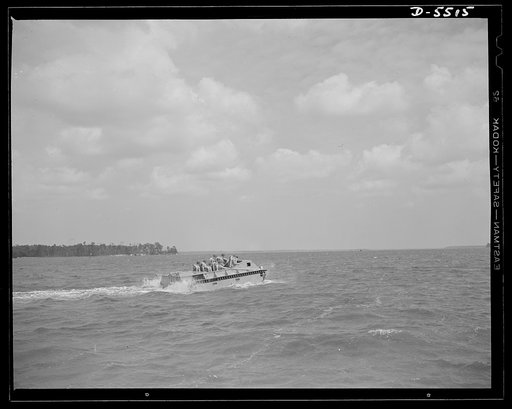 New River, North Carolina. Marine amphibian tractor. The soldiers of the sea have a new troop carrier that serves them well on land and in the water. A special Marine unit, training with an amphibian tractor at New River, North Carolina, is on its way from a battleship to establish a beachhead
