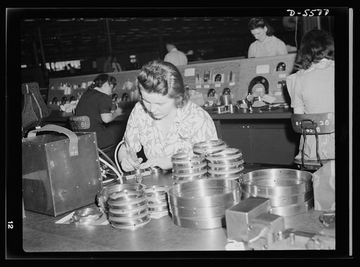 Production. Aircraft engines. That little instrument Verna Lampy is welding looks and sounds a lot like the drill your third bicuspid may be familiar with. It's used in a huge Midwest aircraft plant, however, to etch serial and inspection numbers on airplane motor parts, making a permanent record to