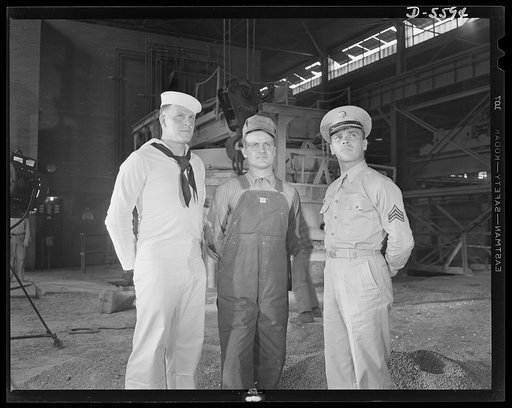 A poster comes to life. They're working together, these three Americans whose roles in the war effort are equally important and interdependent. Radio-aviation Chief John Marshall Evans, steelworker George Woolslayer and Sergeant French L. Vineyard watch the roaring steel furnaces in an Allegheny-Lud