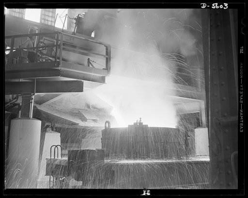 A poster comes to life. With a shower of fiery sparks, molten steel flows from a fifty-ton electric furnace at the Allegheny-Ludlum mill into a waiting ladle below. This is the vital liquid metal from which guns, ships and tanks are made. Allegheny-Ludlum, Pittsburgh
