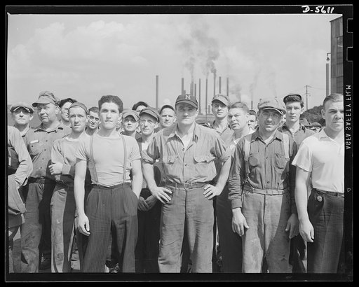 A poster comes to life. The roar of blast furnaces and the whistles of mill yard trains beat a rhythmic accompaniment to the words of Sergeant Vineyard and Chief Evans who spoke to a group of steelworkers at one of Allegheny-Ludlum's plants. At this informal gathering in the mill yard, the serviceme