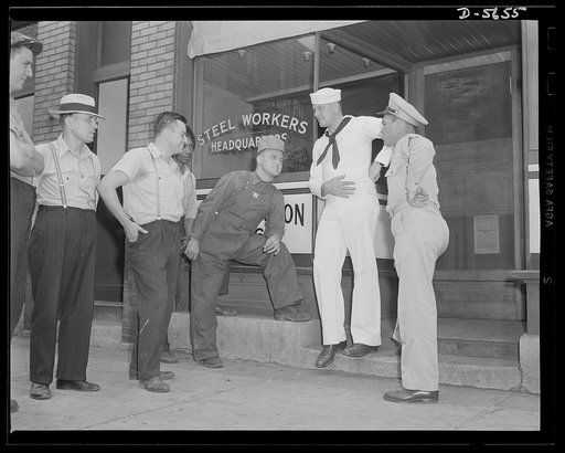 A poster comes to life. A gathering place for many of the workers is the local union headquarters. Woolslayer took his service friends there to "meet the boys." Allegheny-Steel, Pittsburgh, Pennsylvania