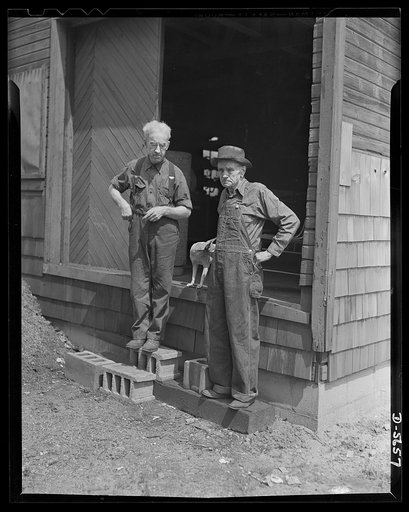 Me and the old gent. "The old gent and myself," only two-man labor-management war production drive committee in the United States. Jake Sparling, left, sixty-year-old head of Sparling Pulley Manufacturing Company, Bay City, Michigan, and Percy Fogelsonger, seventy-nine-year-old ex-lumberjack, have b