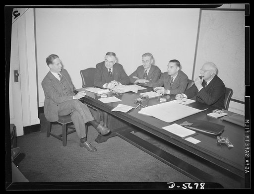 Meeting. Consultant Board of Smaller War Plants Division. Meeting of the Consultant Board of the Smaller War Plants Division in Washington, October 23,1942, to assist in forming policies and to advise on problems relating to production orders, facilities, labor and finance. Board members are, left t