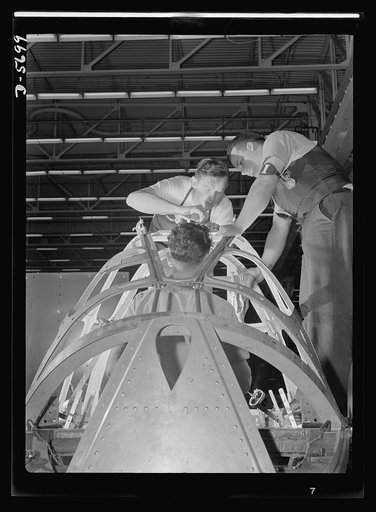 Production. Willow Run bomber plant. Advanced assembly includes riveting and drilling the nose of the bomber made in the giant Willow Run plant. Open spaces will be fitted with a form of Plexiglas to give the bombardier a complete wide-angle view. Ford plant, Willow Run