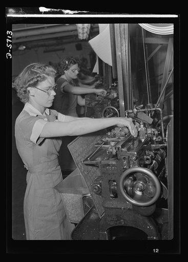 Women in industry. Tool  production. Arms for the love of America! The capable young woman whose strong hands guide this cutoff machine is one of a Midwest drill and tool factory's many women employees. Almost 1,000 women have recently been employed in this comparatively new plant; sole men workers,