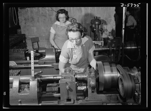 Women in industry. Tool  production. Two of nearly 1,000 women who "keep 'em rolling" in a large Midwest drill and tool plant, these young workers are skilled lathe operators putting taper shanks on twist drills which are used in all war production. Republic Drill and Tool Company