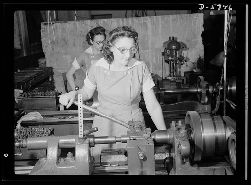 Women in industry. Tool  production. Two of nearly 1,000 women who "keep 'em rolling" in a large Midwest drill and tool plant, these young workers are skilled lathe operators putting taper shanks on twist drills which are used in all war production. Republic Drill and Tool Company