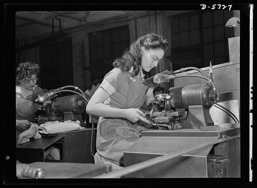Women in industry. Tool  production. A job which was formerly done by hand (and by men) is done in this large Midwest drill and tool plant by women at machines. These young workers are putting precision-ground points on drills which will be used in production of America's ships, tanks and guns. It t