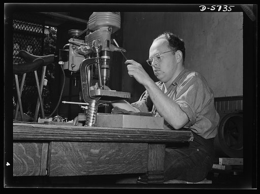 Manpower. Handicapped workers. A victim of infantile paralysis, Robert H. Drake, twenty-six, does a job any man would be proud of. He's an expert drill press operator in a Baltimore factory which makes airplane motor parts. Despite restricted use of both legs and his right arm, Robert maintains high
