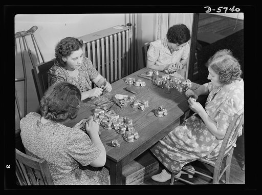 Manpower. Handicapped workers. Despite physical handicaps, these women are doing work that's vital to Uncle Sam's war effort. At the Maryland League for Crippled Children, they're hand-burring Y's for airplane engines, on subcontract to a Baltimore engineering company. White Engineering Company, Bal