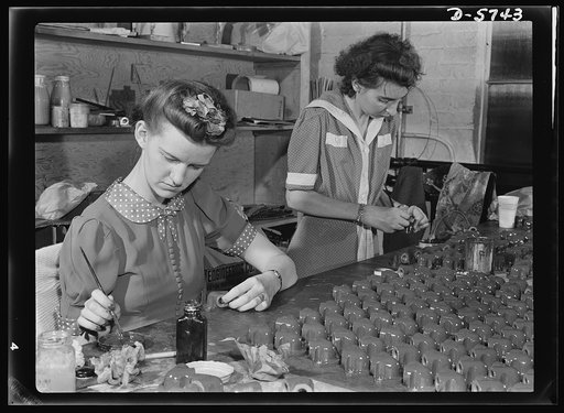 Manpower. Handicapped workers. Auburn-haired, twenty-one-year-old, Belva Fletcher, left, handicapped by progressive paralysis, is still able to do a good job for Uncle Sam. With twenty-five-year-old Henriette Furley, she's painting Y's for airplane engines at the Maryland League for Crippled Childre