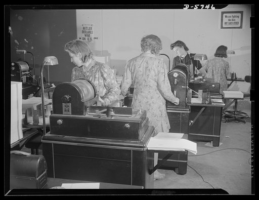 Office equipment used by the War Production Board (WPB). Here are a few of the twelve automatic mimeographs in the WPB's duplicating section. Each of these machines runs twenty-four hours a day and turns out 6,000 copies in an hour