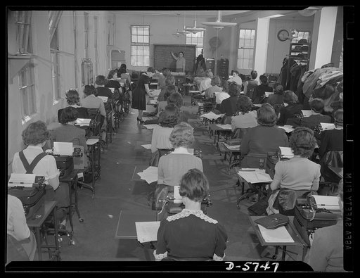 Office equipment used by the War Production Board (WPB). The classroom of the WPB training pool. Here stenographers and typists are made familiar with agency organization, procedures, routing and priorities, etc.