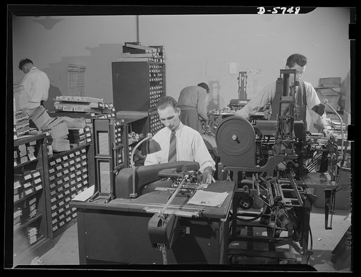 Office equipment used by the War Production Board (WPB). Approximately 8,000 envelopes an hour are addressed on these addressograph machines, a part of the WPB's office equipment