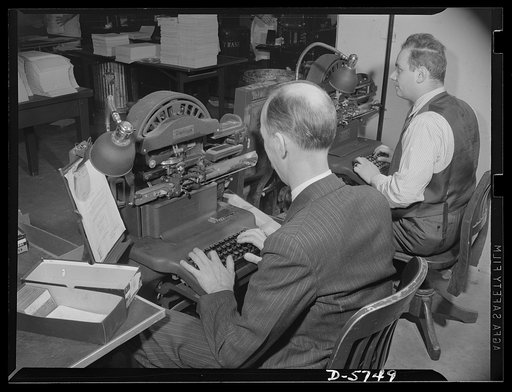 Office equipment used by the War Production Board (WPB). These two graphotype machines cut metal address plates in the addressing department of the WPB