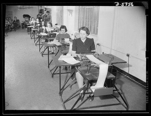 Office equipment used by the War Production Board (WPB). Some of the twenty-four form-writing machines used by the WPB to write control cards (PD-1A) for applicants for preference ratings