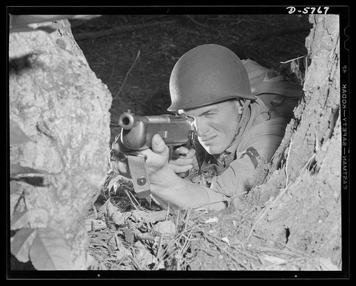 New River, North Carolina. Marine Corps submachine gunners. The Reising submachine gun is giving a good account of itself in the Marine Corps. This leatherneck, in training at New River, North Carolina, finds it a very efficient fighting tool. Marine barracks, New River, North Carolina