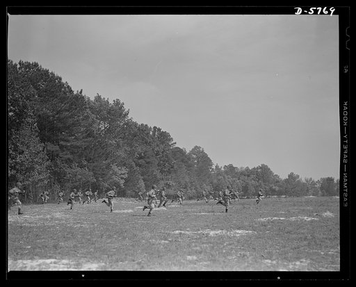New River, North Carolina. Marine infantry. The heroes of Tripoli, the Argonne, and Wake Island, would approve the men who today carry on the glorious traditions of the Marine Corps. These charging leathernecks, in training at New River, North Carolina, are hardened, trained, well-equipped soldiers.