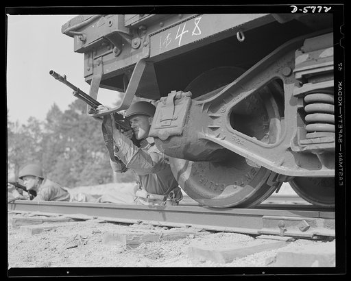 New River, North Carolina. Marine infantry. In the hands of a hard, capable leatherneck, the Browning automatic rifle is a versatile and effective fighting tool. This Marine, in training at New River, North Carolina, knows how to get the best out of it. Marine barracks, New River, North Carolina