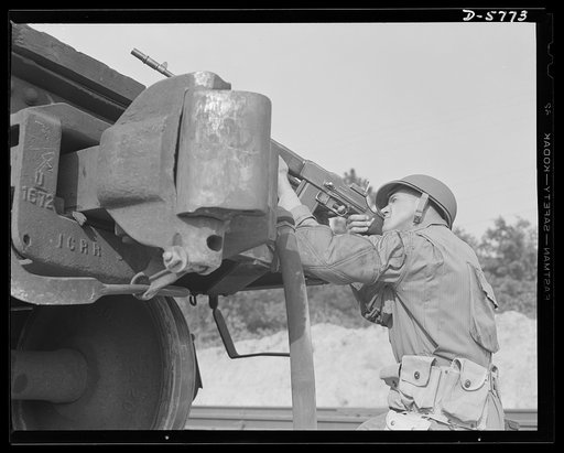 New River, North Carolina. Marine infantry. In the hands of a hard, capable leatherneck, the Browning automatic rifle is a versatile and effective fighting tool. This Marine, in training at New River, North Carolina, knows how to get the best out of it. Marine barracks, New River, North Carolina