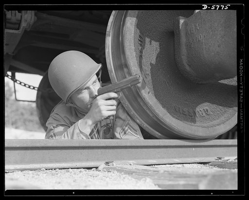 New River, North Carolina. Marine infantry. Danger is his dish. This tough, well-trained Marine can deal out a lot of punishment with his .45 automatic. He is participating in maneuvers at the New River, North Carolina base. Marine barracks, New River, North Carolina