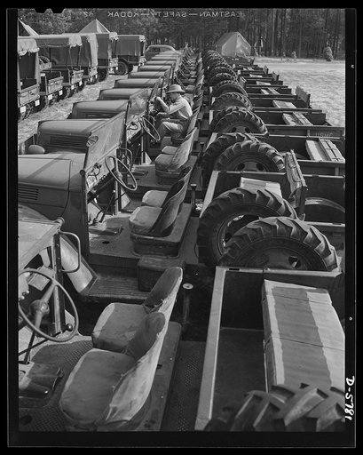 New River, North Carolina. Marine truck transport unit. Military trucks must line up for inspection, too. A motor transport unit in the truck area at New River, North Carolina. Marine barracks, New River, North Carolina