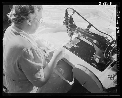 Production. Parachute making. There is far more to hemming this parachute than running the sewing machine. The operator must match pencil marks on the braid with pencil marks on the seams to turn out infallible parachutes for men in the Air Force. Pioneer Parachute Company, Manchester, Connecticut