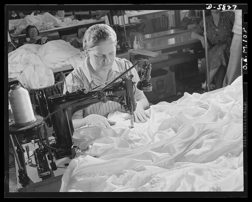 Production. Parachute making. A strong seam for a parachute that will see a lot of action is being made as this operator in an Eastern factory does zig-zag stitching with her machine. Pioneer Parachute Company, Manchester, Connecticut