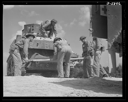 Fort Knox, Kentucky. Armored force personnel. Litter bearers go through their routine as the armored force outfit to which they belong engage in war exercises at Fort Knox, Kentucky