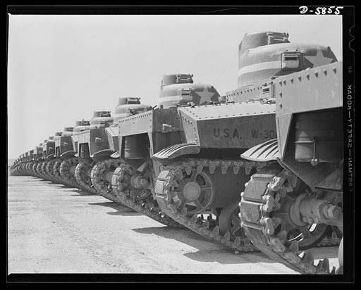 Fort Knox, Kentucky. M-3 tanks. America's armed might grows greater every day. These M-3 tanks, lined up for inspection at Fort Knox, Kentucky, are but a few of the many powerful weapons with which our forces are equipped. These M-3s are being used in training tank crews
