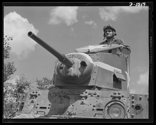 Fort Knox, Kentucky. Light tanks. The Axis is not going to like the American fighting men it will soon be meeting on the battlefronts of the world. A good example of a man becoming unpopular in Japanese circles is this hardened "tanker," in training with light equipment at Fort Knox, Kentucky