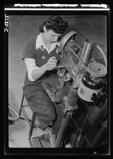 Women in industry. Aircraft motor workers. Youthful Paderewskis, take note! Her finger made superbly flexible by years of piano practice, this young employee of a Midwest aircraft motor plant finds her musical training of great assistance in her war job. The operation of this drill press demands con