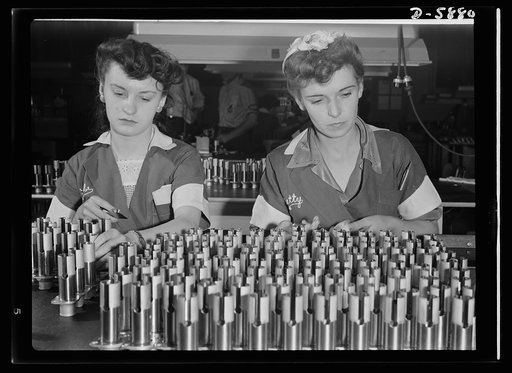 Women in industry. Aircraft motor workers. It there's the slightest flaw in any of these airplane motor parts, it will be caught by Gabrielle Corveau (left) and Elizabeth Kamerer, two youthful inspectors employed by a Midwest aircraft motor plant. An erstwhile office worker, model and salesgirl, nin