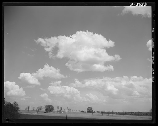 Clouds. No clouds of war these, but peaceful carriers of rains that help broad acres of Kentucky farmland to bear life-giving crops for the nation's needs