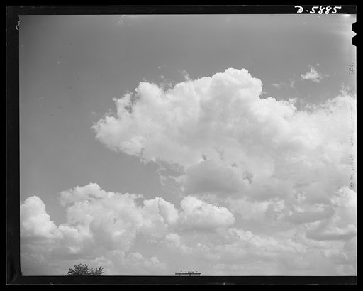Clouds. No clouds of war these, but peaceful carriers of rains that help broad acres of Kentucky farmland to bear life-giving crops for the nation's needs