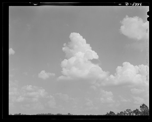 Clouds. No clouds of war these, but peaceful carriers of rains that help broad acres of Kentucky farmland to bear life-giving crops for the nation's needs