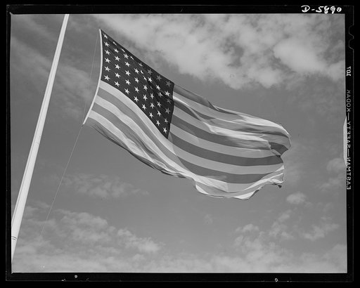 Fort Knox flags. High above Fort Knox, Kentucky, over a true "home of the brave," the floating folds of the Star Spangled Banner symbolize the American way of life to soldiers in training for the battles that will bring freedom to an unhappy, war-torn world