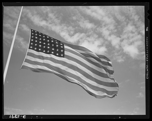 Fort Knox flags. High above Fort Knox, Kentucky, over a true "home of the brave," the floating folds of the Star Spangled Banner symbolize the American way of life to soldiers in training for the battles that will bring freedom to an unhappy, war-torn world