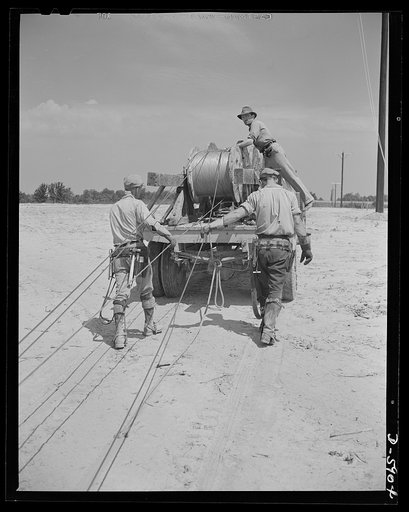 Fort Knox. Electric power line construction. A new electric power line for the Army. A pole line crew of a large construction company extends service into Fort Knox, Kentucky, where American soldiers are training and hardening for modern warfare