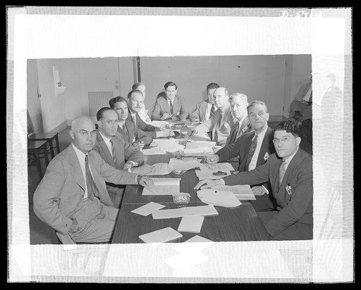 War production drive committee of technical experts. The war production drive's technical committee of experts, established to pass on war production suggestions for which Certificates of Individual Production Merit and Citations of Individual Production Merit will be awarded. Left to right: John L.