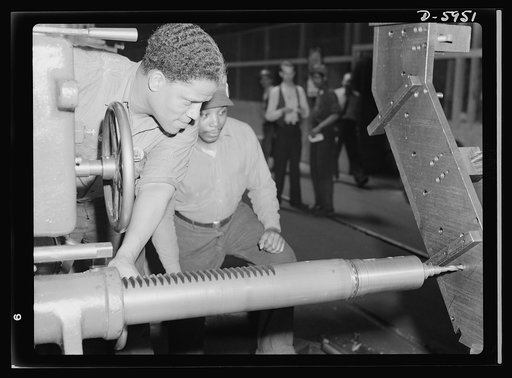 Manpower. Americans all. Being of a different racial strain from Hitler or Hirohito, Guy L. Miles wouldn't stand much chance of survival in an Axis-controlled America. A skilled machine operator who makes parts for medium tanks in a large Midwest factory, he's fighting the fascist fanatics as grimly