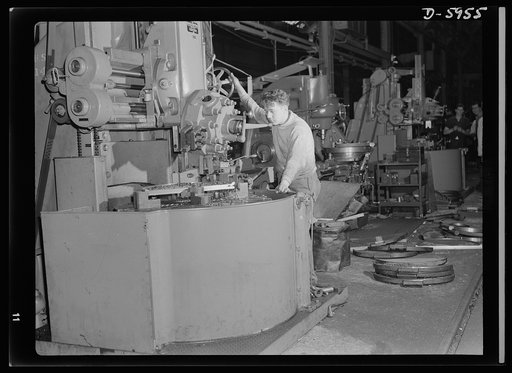 Manpower. Americans all. Though his parents were born in the "old country" and European customs are maintained in his home, Michael Kassalo is as American as pork and beans. Michael's job as a vertical turret lathe operator in one of the Midwest's largest medium-tank plants gives him the satisfactio