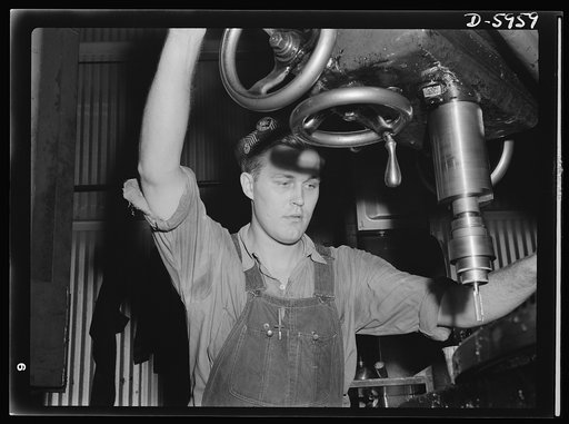Manpower. Americans all. Like most of the young workers in a huge Midwest medium-tank plant, Herman Silldorf is an American of foreign-born parents. A skilled machine operator, young Silldorf, whose parents came here from Germany, processes parts for medium tanks with the hope that some day soon he'