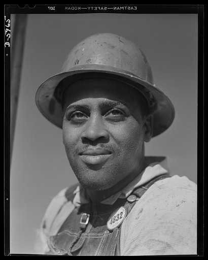 Tennessee Valley Authority (TVA). Construction of Douglas Dam. Negro worker at the TVA's new Douglas Dam on the French Broad River. This dam will be 161 feet high and 1,682 feet long, with a 31,600 acre reservoir area extending forty-three miles upstream. With a useful storage capacity of approximat