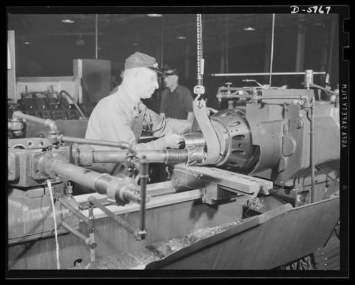 Production. 155mm shells. Boring the burster tube recess of 155mm shell on a Denver lathe in a converted auto plant. Willy's, Toledo, Ohio